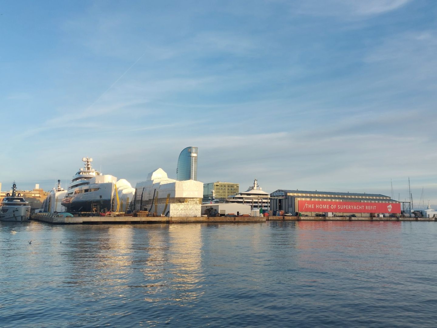 A seaside view of the MB92 refit yard in Barcelona