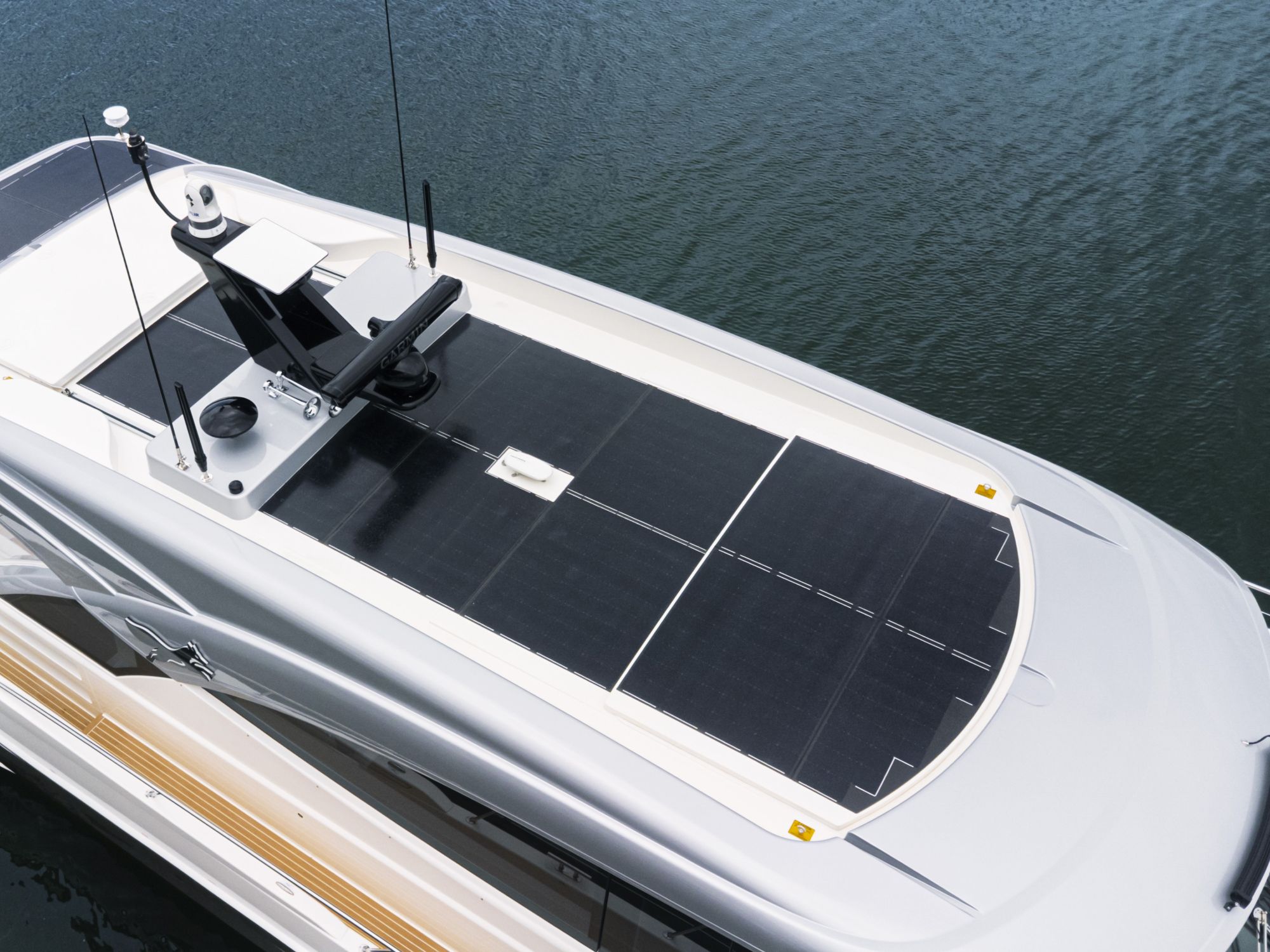 A yacht hardtop features solar panel technology built into the roof