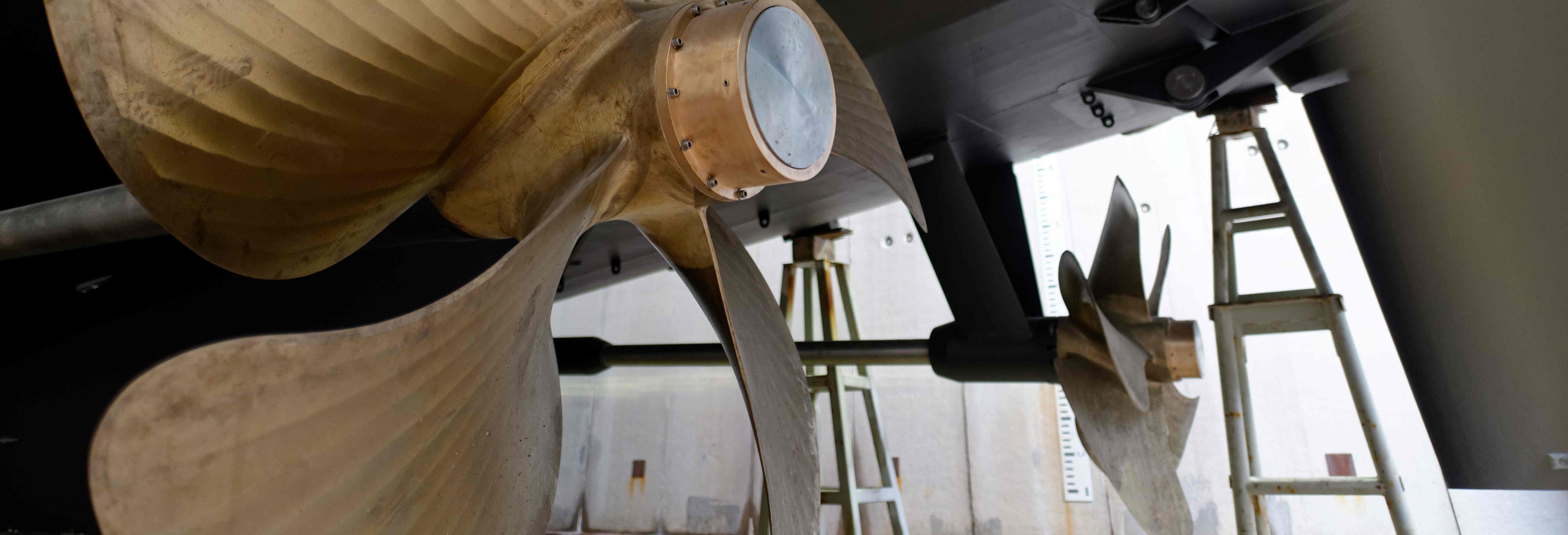 A pair of superyacht propellers being refitted