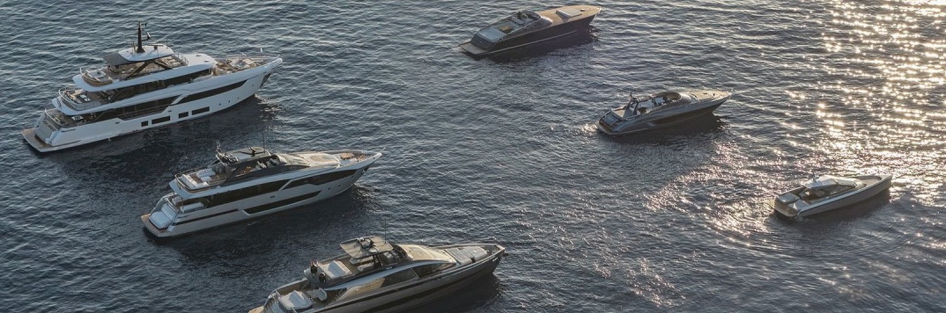 An image showing a range of superyachts and yachts in various sizes from Ferretti Group